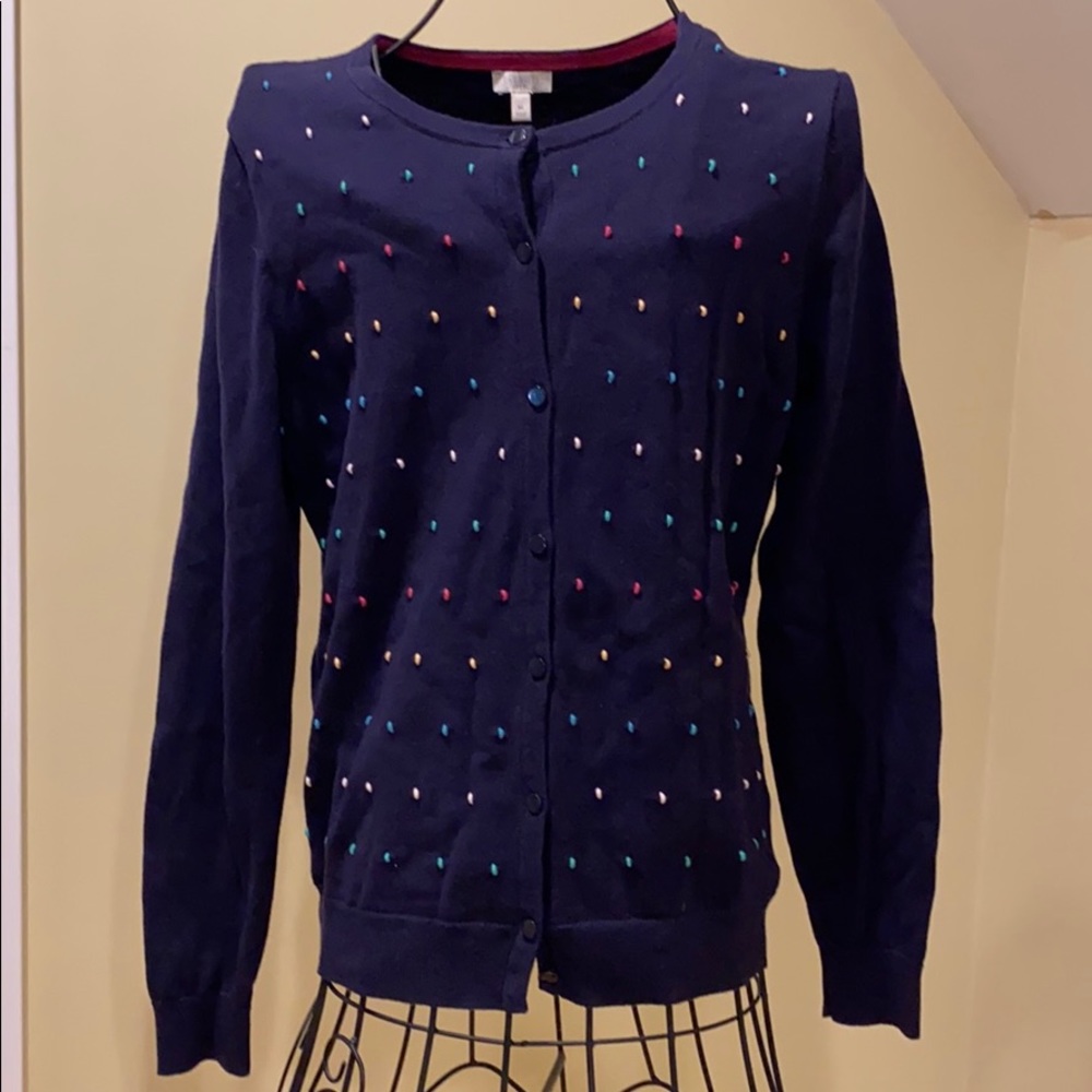 Blue sweater with multicolor polkadots